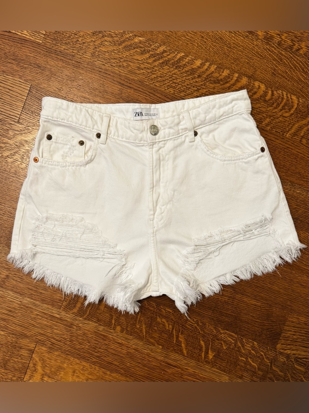 ZARA White Distressed Denim Shorts. Size 8. NWOT. 100% cotton.